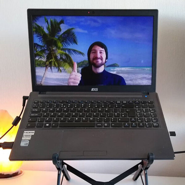 The web designer Paul Jardine on a laptop screen.