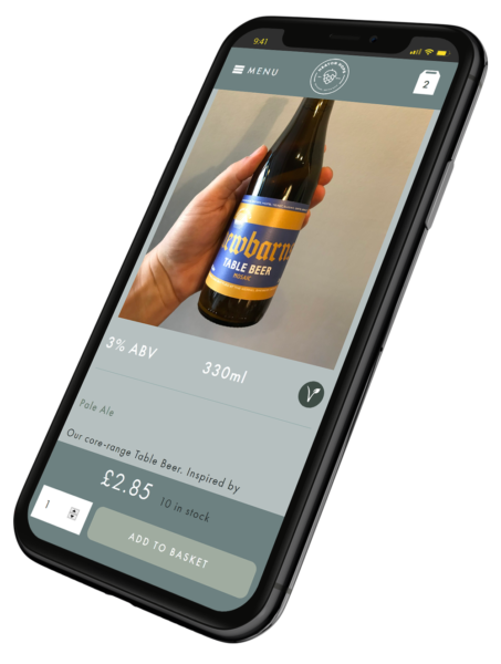 The Heaton Hops website displayed on a mobile phone.