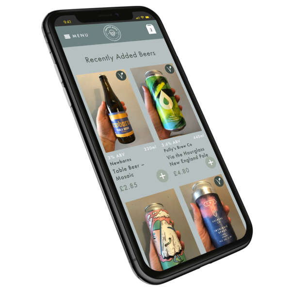 The Heaton Hops website displayed on a mobile phone.